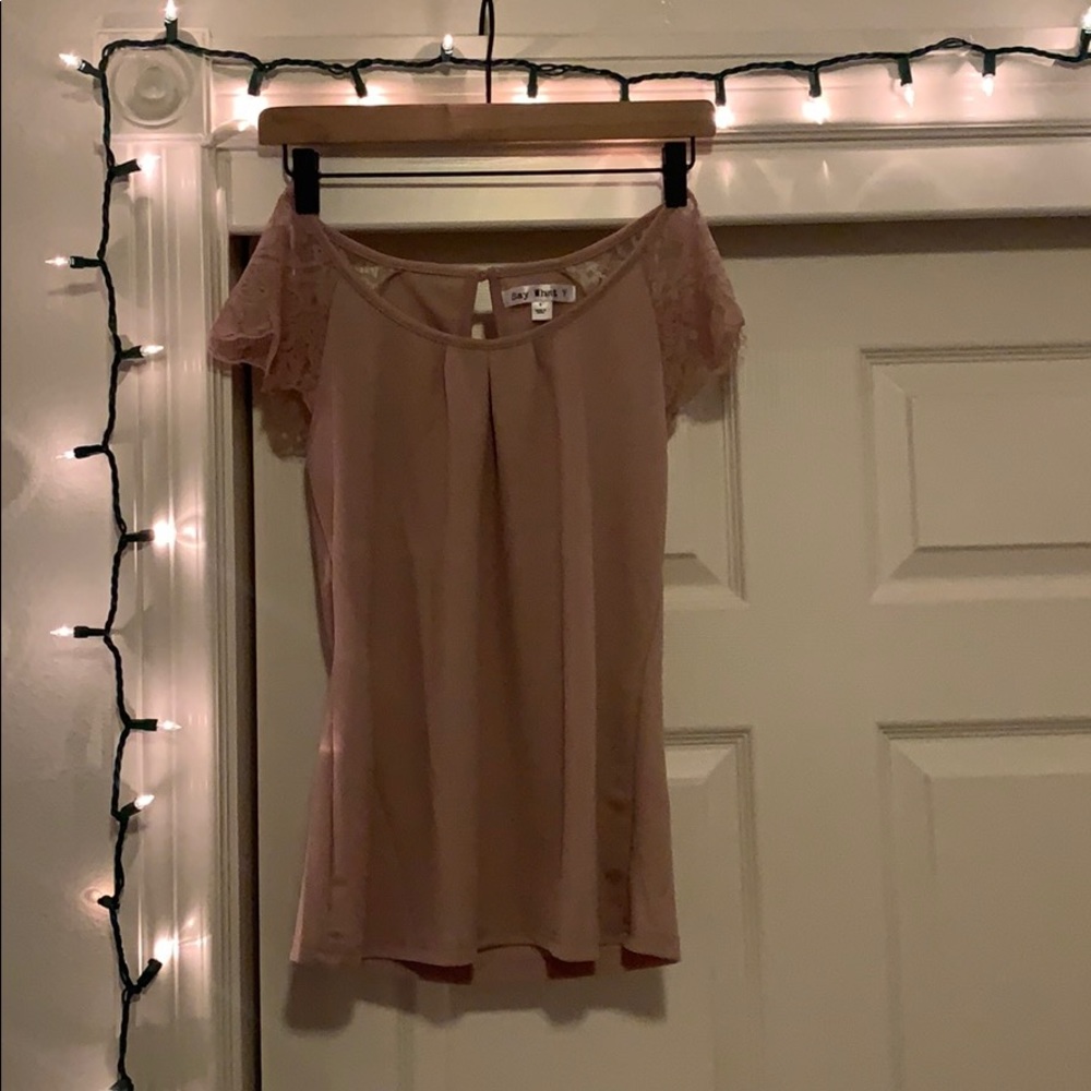mauve colored top with lace sleeves